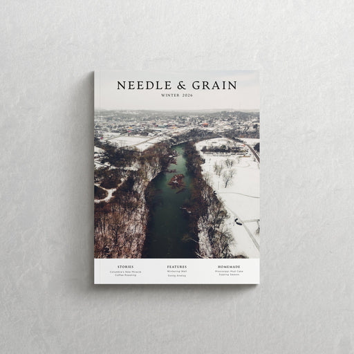 Magazine cover titled 'Needle & Grain' on a gray background winter issue